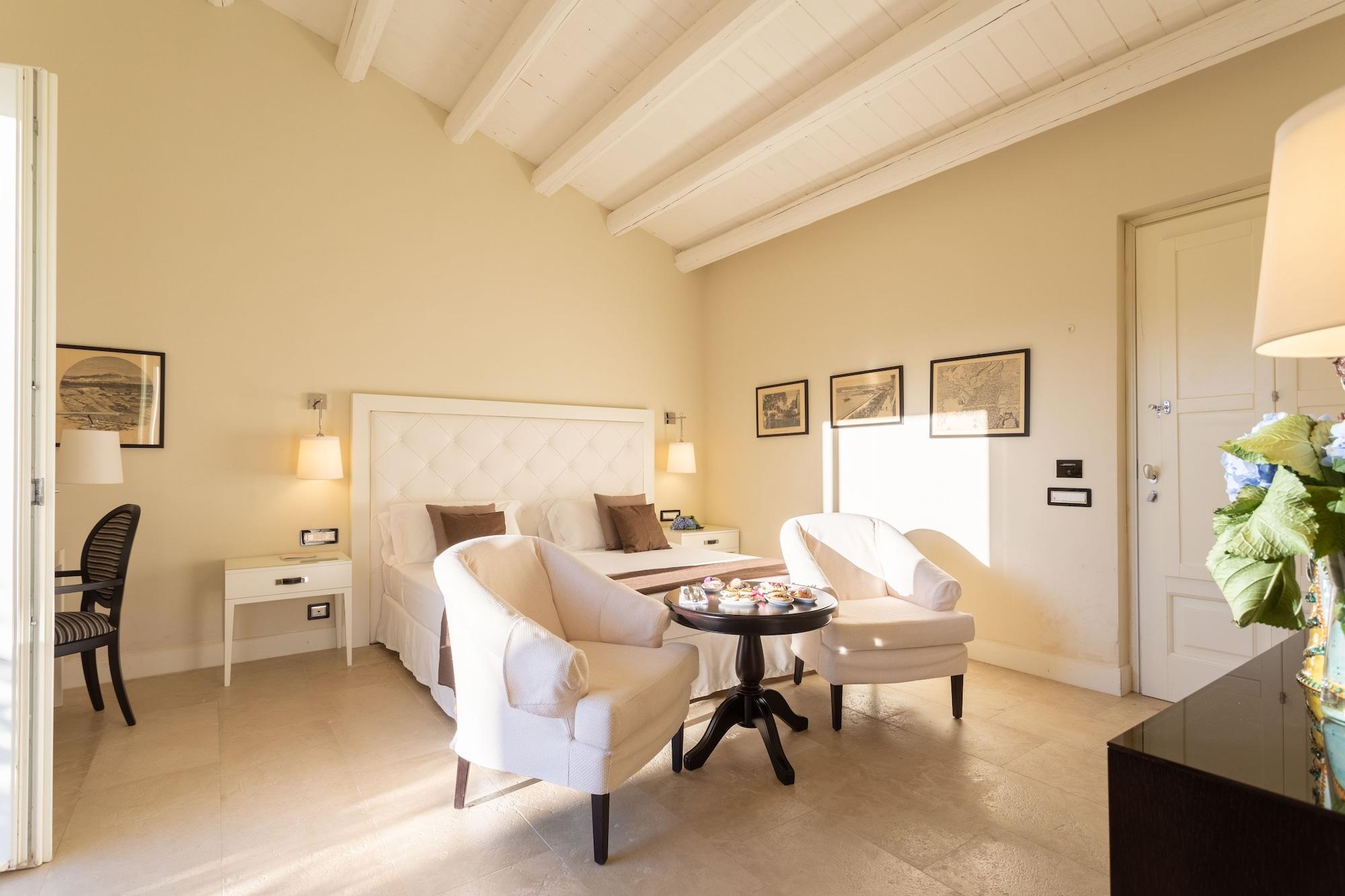 Borgo Di Luce I Monasteri Golf Resort & Spa Syracuse Exterior foto A room at the hotel