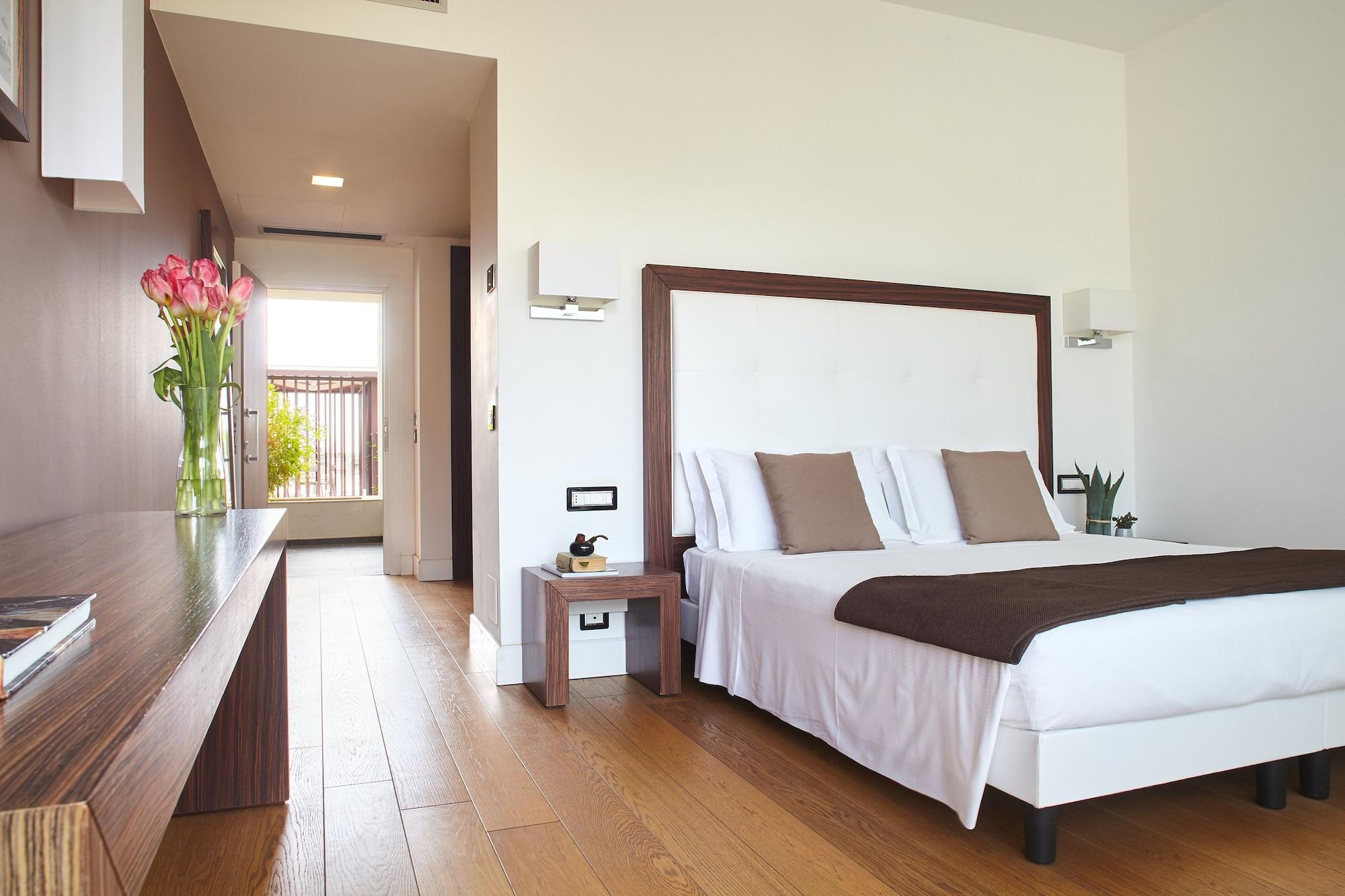 Borgo Di Luce I Monasteri Golf Resort & Spa Syracuse Exterior foto A bedroom at the hotel