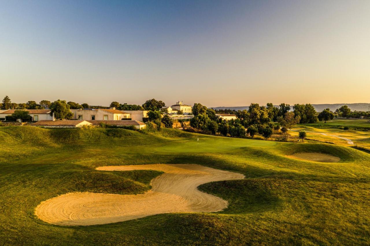 Borgo Di Luce I Monasteri Golf Resort & Spa Syracuse Exterior foto Golf course at the resort